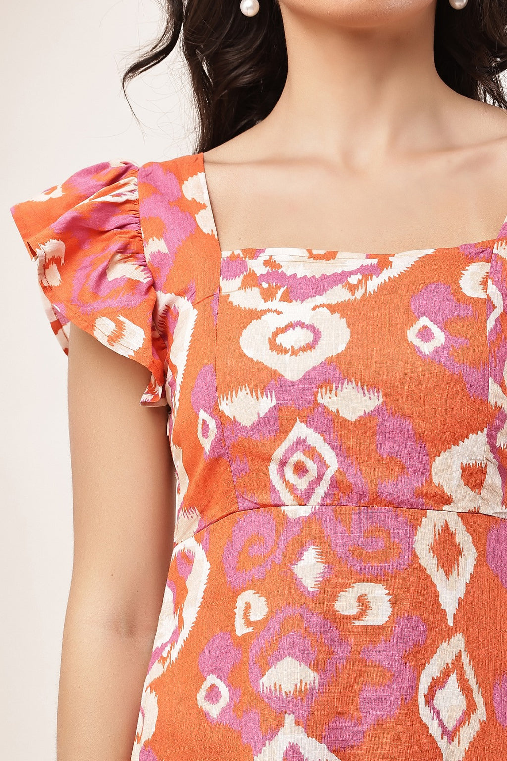 Thoughtful women fit and flare orange midi / calf length dress