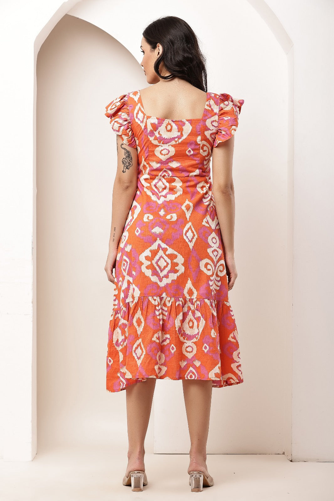 Thoughtful women fit and flare orange midi / calf length dress