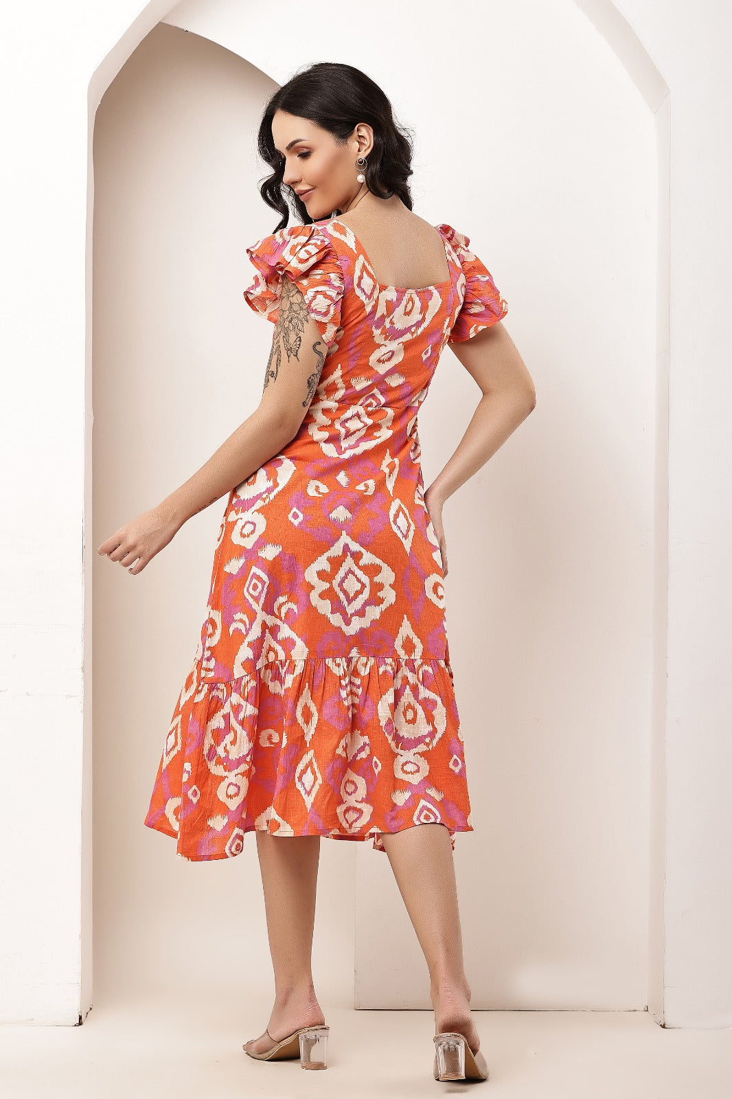 Thoughtful women fit and flare orange midi / calf length dress