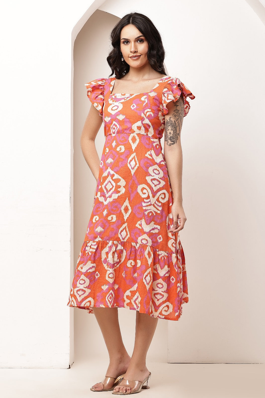 Thoughtful women fit and flare orange midi / calf length dress