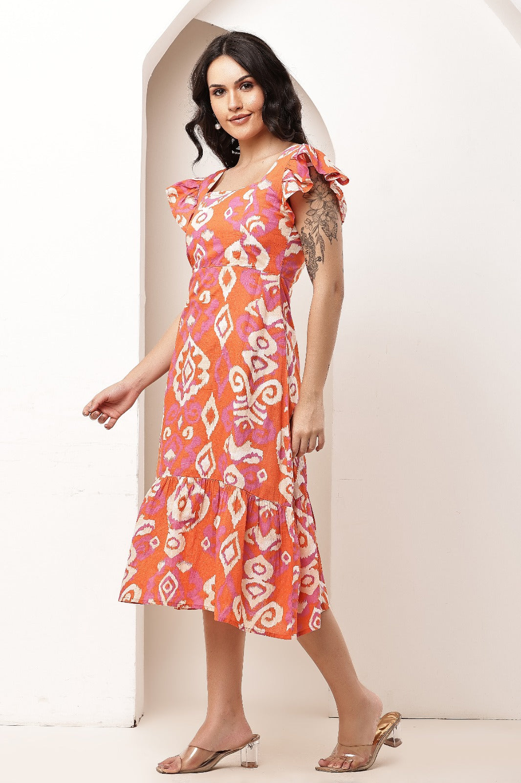 Thoughtful women fit and flare orange midi / calf length dress